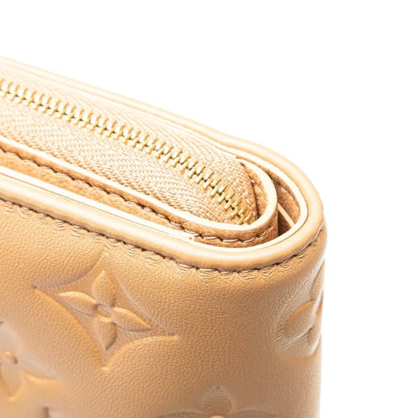 Pre-owned Louis Vuitton Monogram Embossed Coussin Lou Wallet Brown