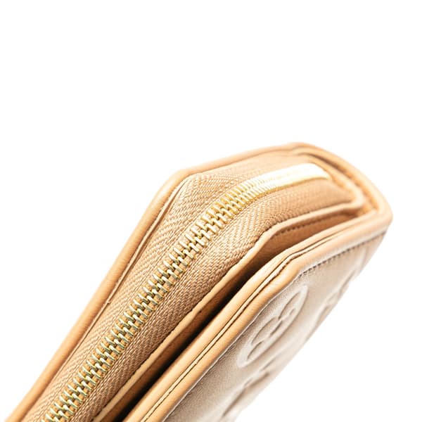 Pre-owned Louis Vuitton Monogram Embossed Coussin Lou Wallet Brown