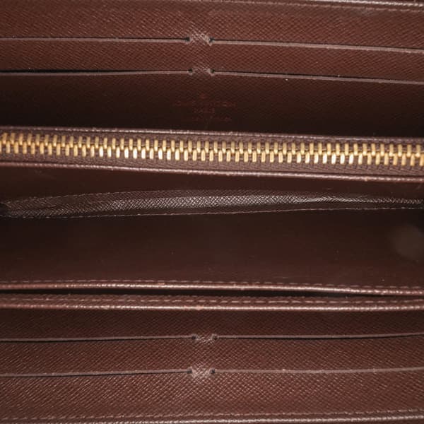 Pre-owned Louis Vuitton Damier Ebene Zippy Wallet Brown