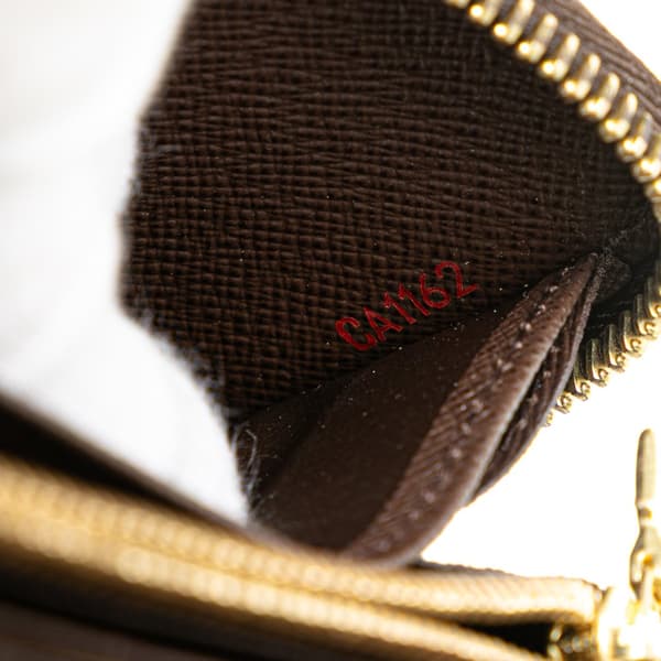 Pre-owned Louis Vuitton Damier Ebene Zippy Long Wallet Brown