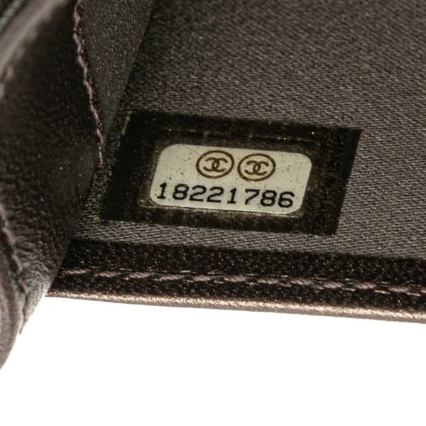 Pre-owned Chanel Embossed Lambskin CC Camellia Bifold Wallet Black
