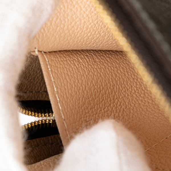 Pre-owned Louis Vuitton Monogram Mini Lin Cosmetic Pouch Brown