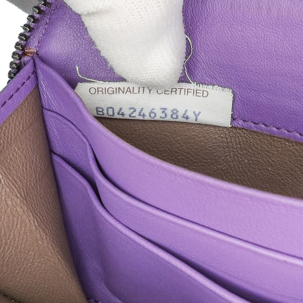 Pre-owned Bottega Veneta Leather Intrecciato Zip Around Wallet Purple