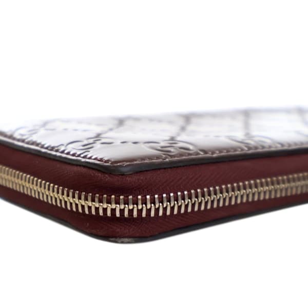 Pre-owned Gucci Patent Guccissima Zip Around Long Wallet Red