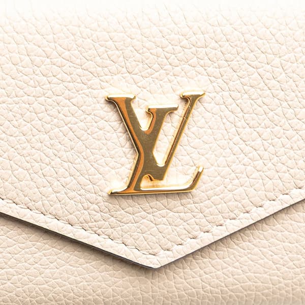 Pre-owned Louis Vuitton Leather Lockmini Wallet Brown