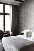 Miniatyrbillede 4 af 8: Origin Wallcoverings tapet industrielle korrugerede metalplader 3D mørkegråt 53 cm x 10,05 m