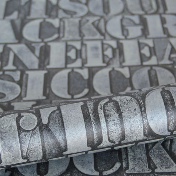 Origin Wallcoverings tapet gamla metalltryckta bokstäver mörkgrått 53 cm x 10,05 m