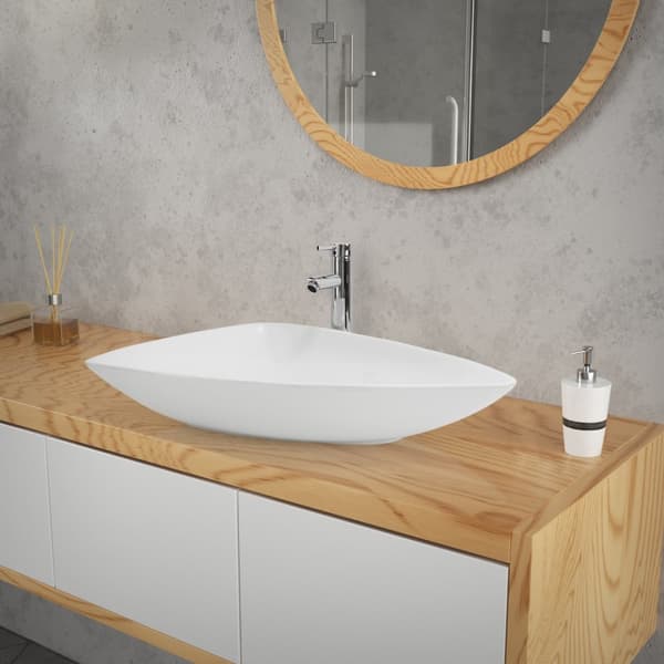 Moderne keramisk håndvask i hvid glans; 69x46x13 cm; trekantet design; til badeværelse og gæstetoilet