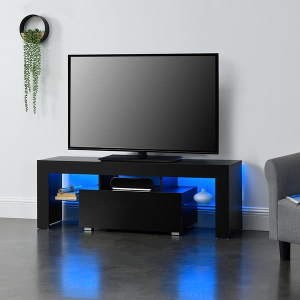 [en.casa]® Tv-bänk Grimsey med LED och fjärrkontroll-hyllplan i glas-öppet fack för dvd-spelare-med låda (högglans svart)-130x35x45cm-melaminbelagd spånskiva-svart